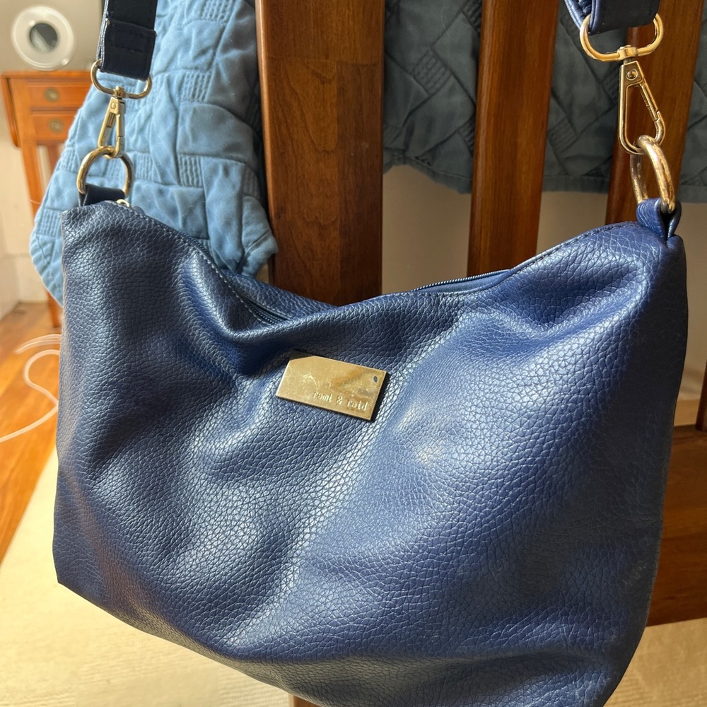 Remi and Reid blue leather purse